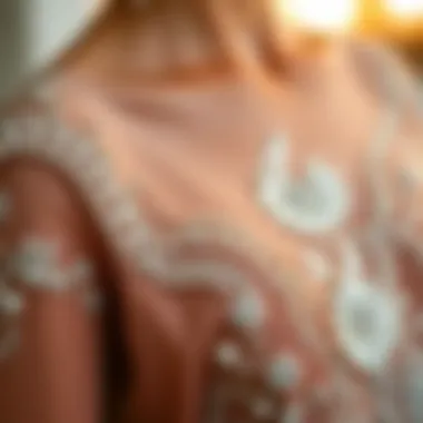 Close-up of intricate beadwork and fabric texture on a formal gown.