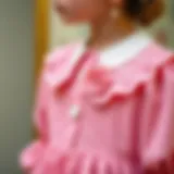 Elegant design of a baby collar dress showcasing intricate details