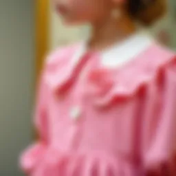 Elegant design of a baby collar dress showcasing intricate details