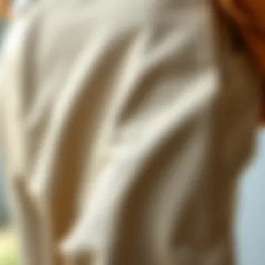 A close-up of the fabric texture of beige trousers