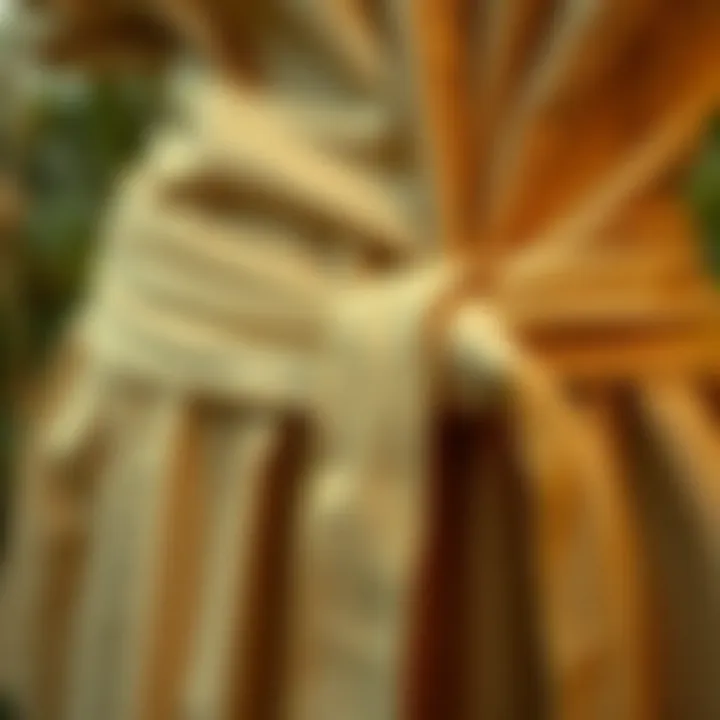 A close-up of the fabric texture of a belted dress highlighting sustainable materials