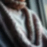 Luxurious draped knitwear showcasing intricate patterns