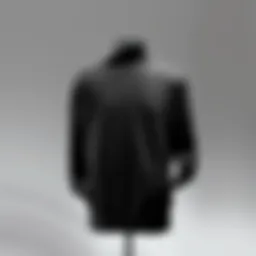 A stylish black sweatshirt displayed on a mannequin against a neutral background