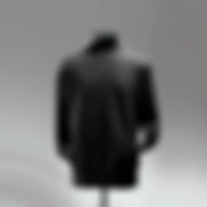 A stylish black sweatshirt displayed on a mannequin against a neutral background