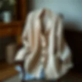 Cozy knitted cardigan draped on a chair