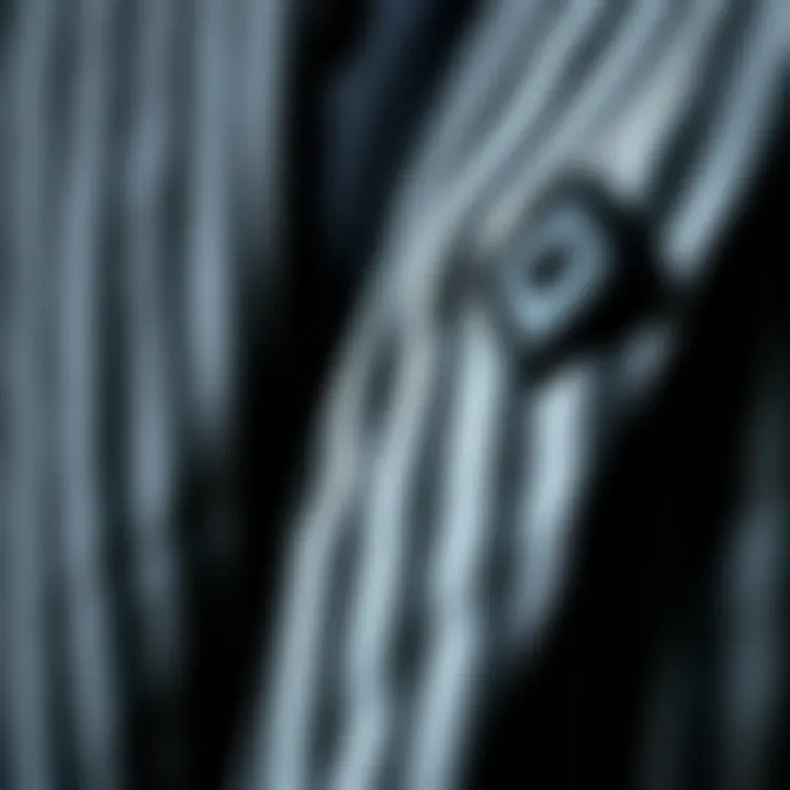 Close-up of fabric texture highlighting the gray and white stripes in a suit.