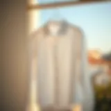 A timeless white shirt hanging elegantly on a hanger