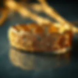 An elegant gold bracelet showcasing intricate designs.