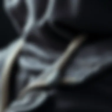 Close-up of the fabric texture of a hooded jacket showcasing its quality and design.