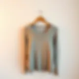 Stylish square-neck sweater displayed elegantly on a minimalist background