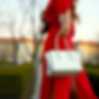 Red Dress with White Handbag Chic red dress paired with a white handbag