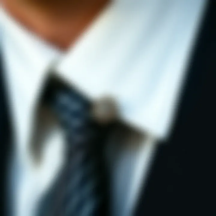 Close-up of a tie with a pin adding refinement