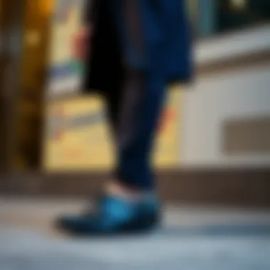 A stylish outfit featuring navy blue shoes paired with a suit