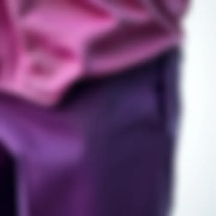 Close-up of fabric details and texture of purple trousers.