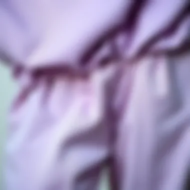 Texture of Lilac Tracksuit Fabric Close-up of the fabric texture of lilac tracksuit bottoms