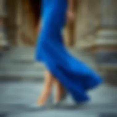 Formal blue dress matched with classic pumps