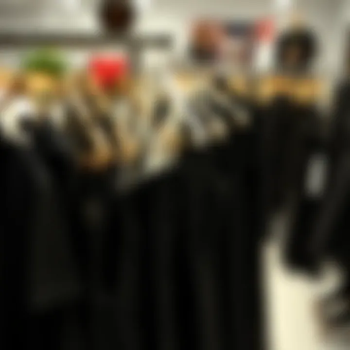 Diverse Collection of Mini Black Dresses A collection of mini black dresses in various fabrics and designs on a chic rack.