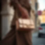 Elegant rose gold handbag styled with a chic outfit