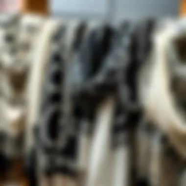 Different types of black and white shawls displayed artistically