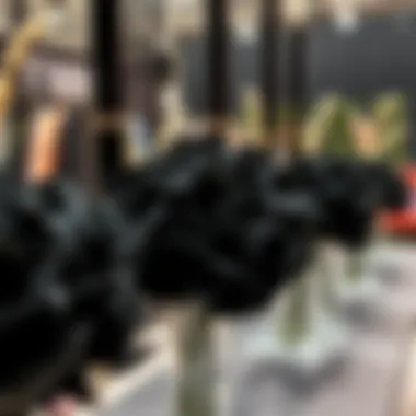 Elegant black flower arrangements displayed at a fashion event
