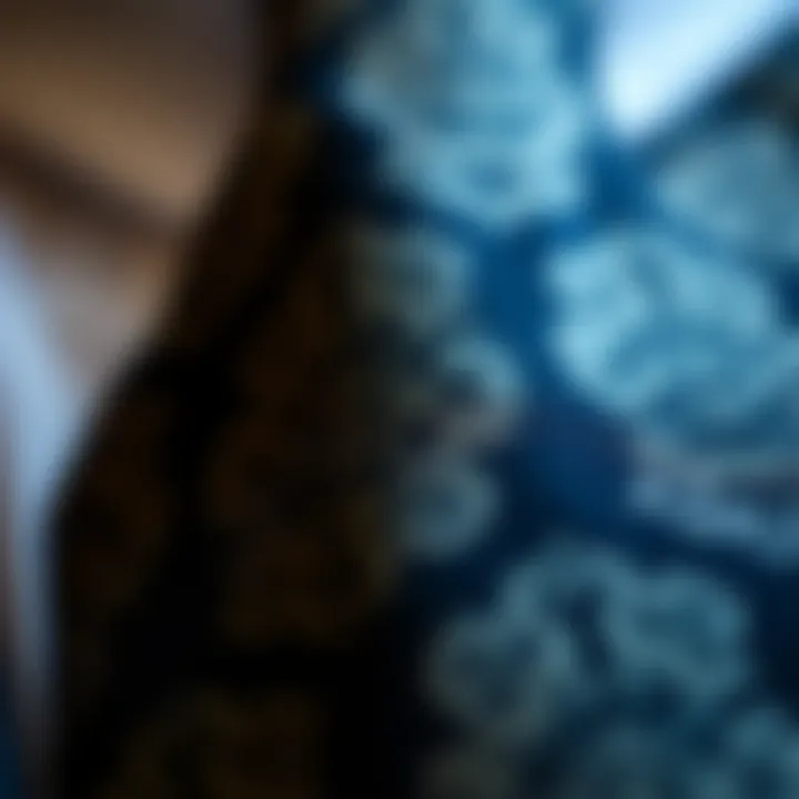 Close-up of intricate patterns on a black tie fabric