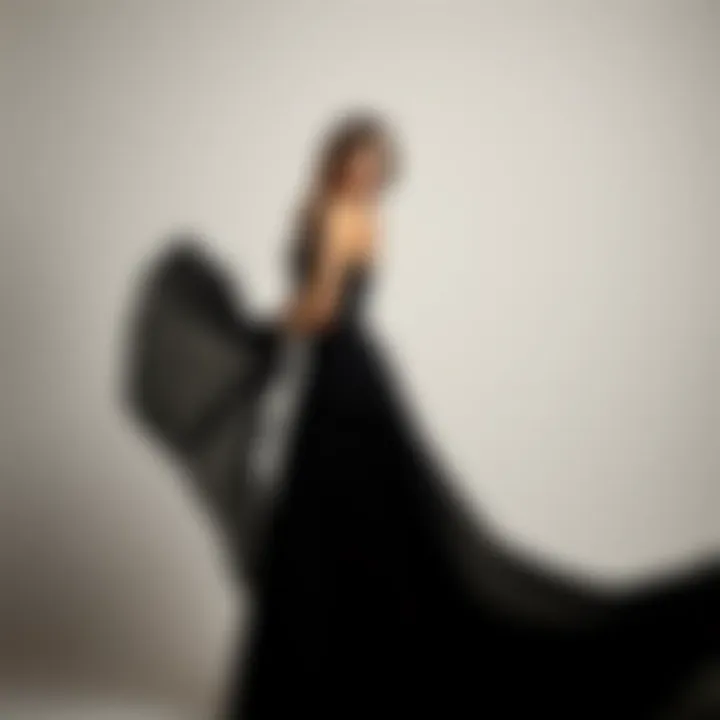 Elegant black chiffon dress on a model in a graceful pose