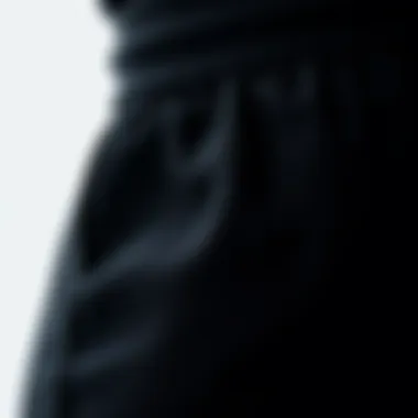 Close-up of luxurious fabric texture of black knit pants