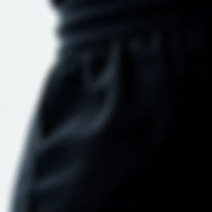 Close-up of luxurious fabric texture of black knit pants