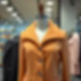 Chic vison color jacket displayed elegantly on a mannequin