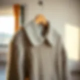 Elegant knitted sweater with a collar displayed on a minimalist background